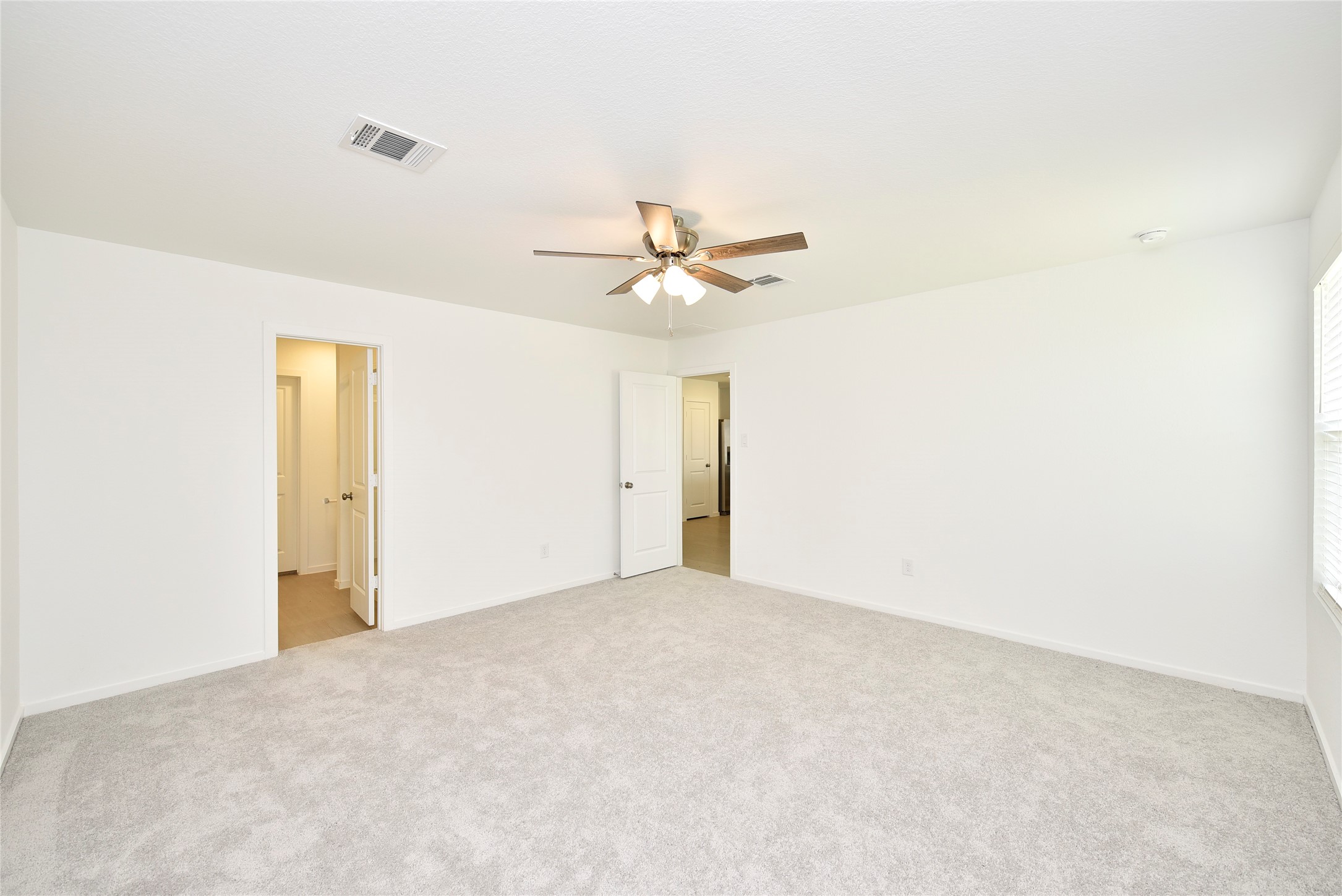 10218 Prairie Dunes Lane Cleveland, TX 77327 - Photo 18 of 32 a view of an empty room