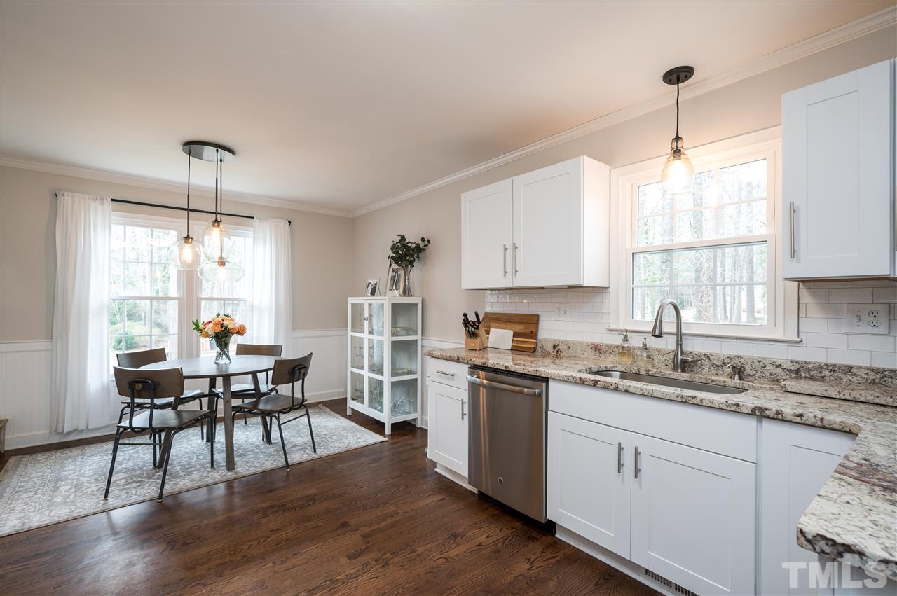 7816 Prospector Place Raleigh, NC 27615 - Photo 5 of 13 Eat-in kitchen with updated fixtures