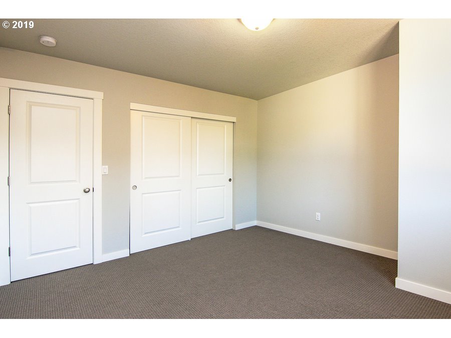 3002 Northeast 171st Street Ridgefield, WA 98642 - Photo 21 of 32 a view of an empty room