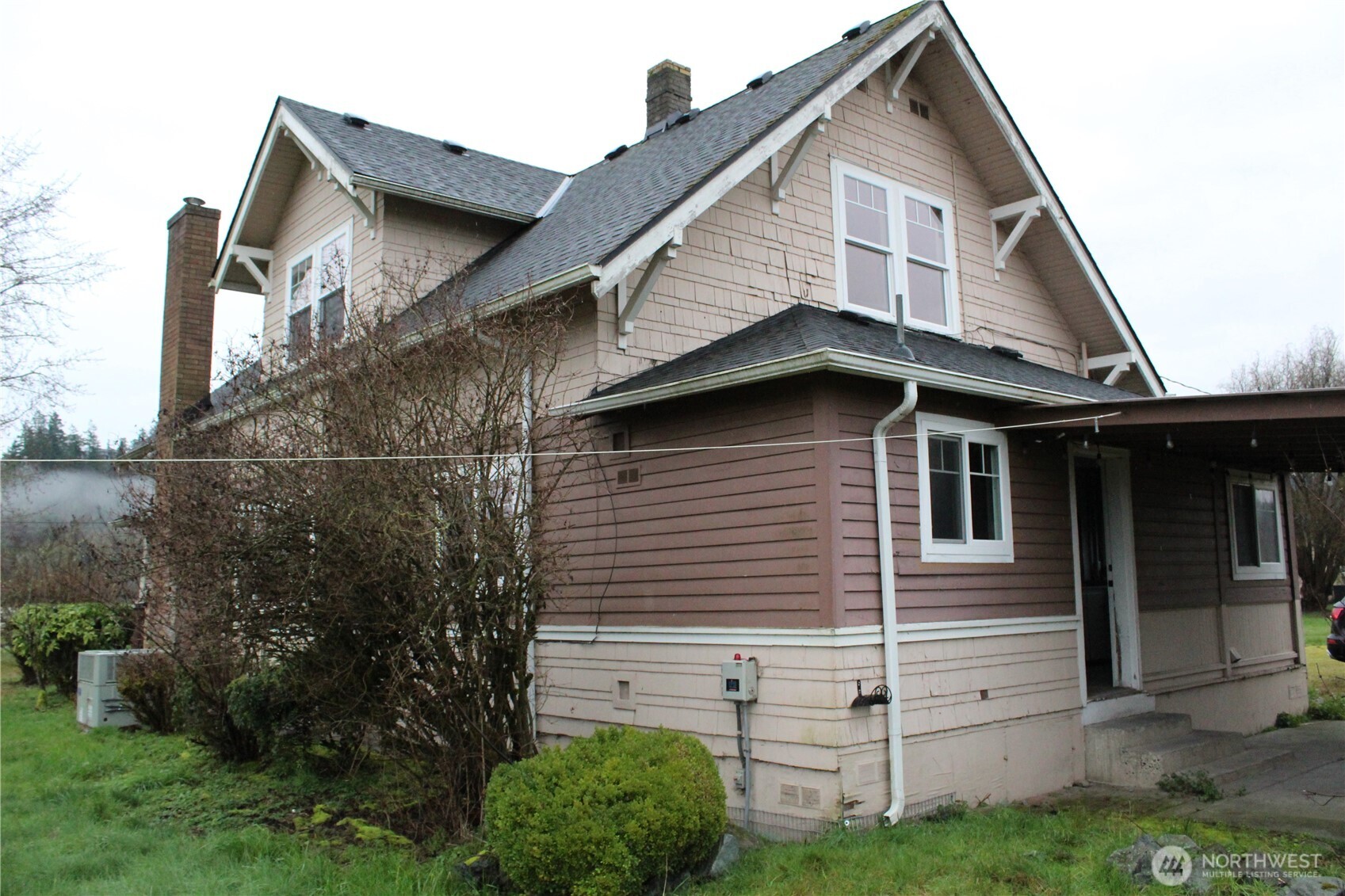 20016 Orville Road East Orting, WA 98360 - Photo 3 of 18 a view of a house with a yard