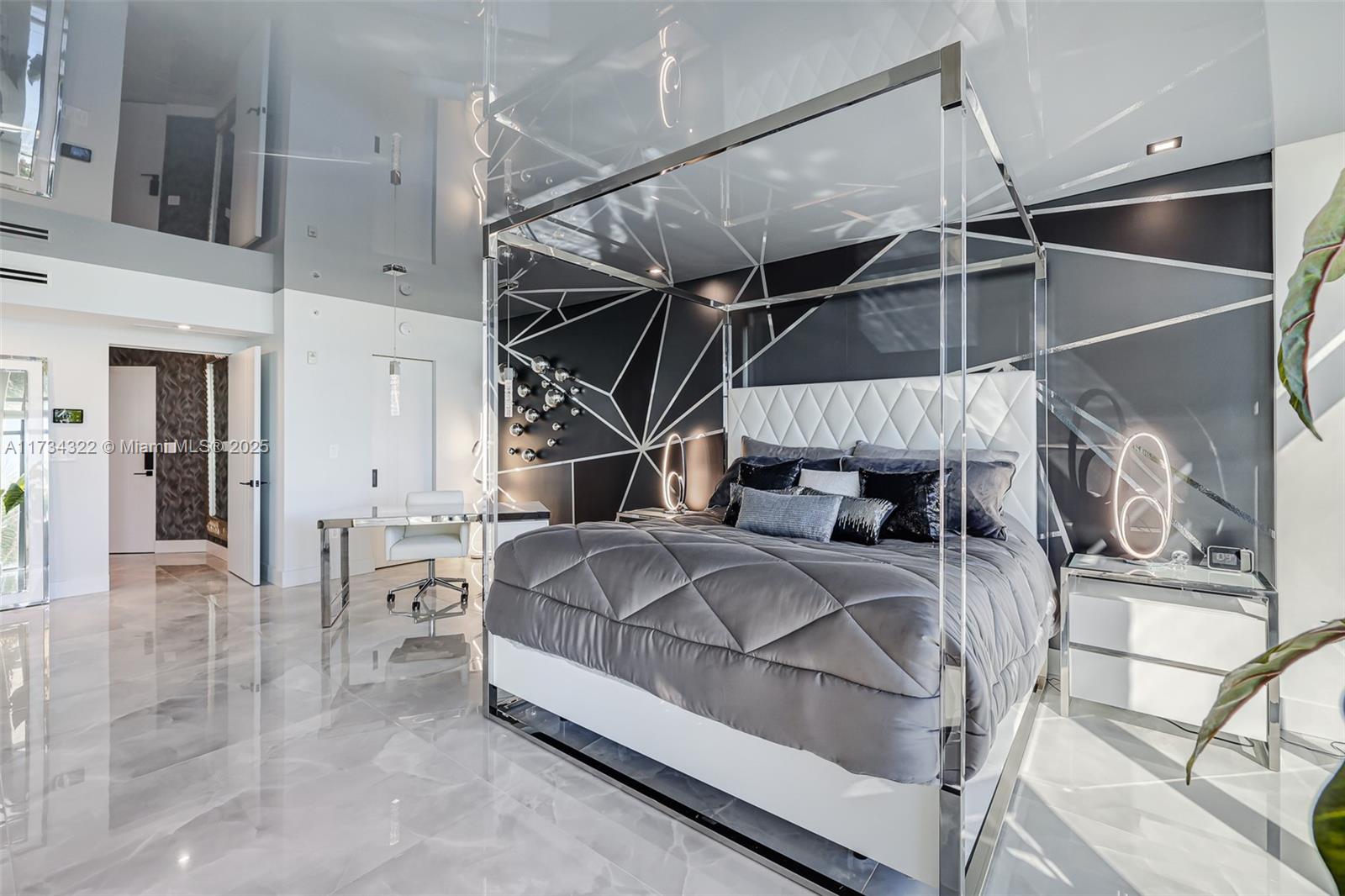 2205 South Surf Road, Unit 4A Hollywood, FL 33019 - Photo 13 of 71 a bed room with a bed and a walk in closet