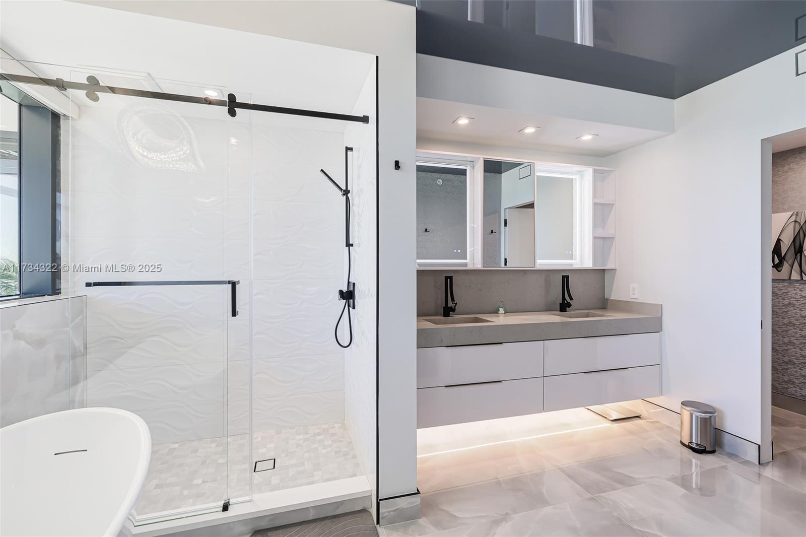 2205 South Surf Road, Unit 4A Hollywood, FL 33019 - Photo 19 of 71 a bathroom with a tub and shower