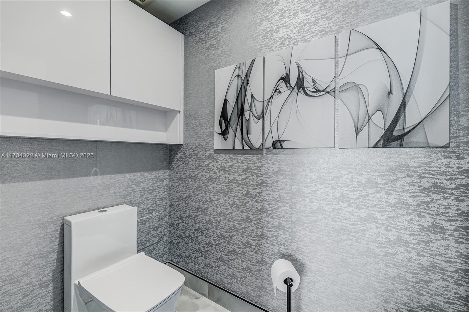 2205 South Surf Road, Unit 4A Hollywood, FL 33019 - Photo 21 of 71 a bathroom with a toilet and a shower