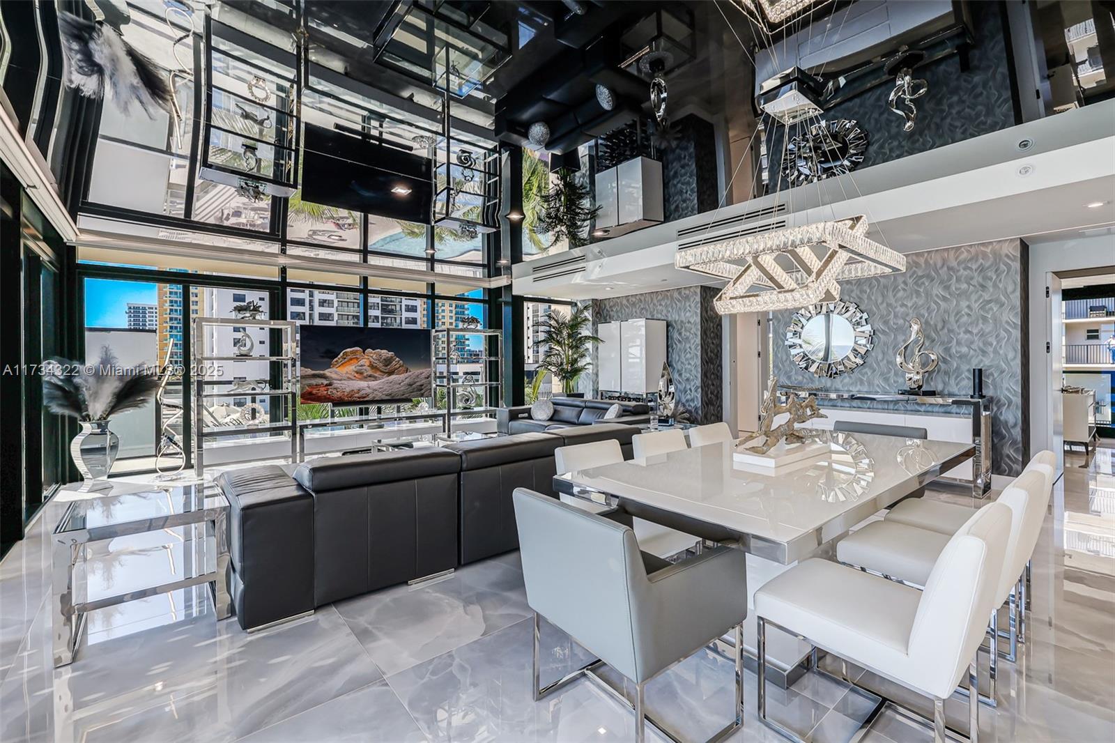 2205 South Surf Road, Unit 4A Hollywood, FL 33019 - Photo 37 of 71 a kitchen with stainless steel appliances granite countertop a sink and cabinets