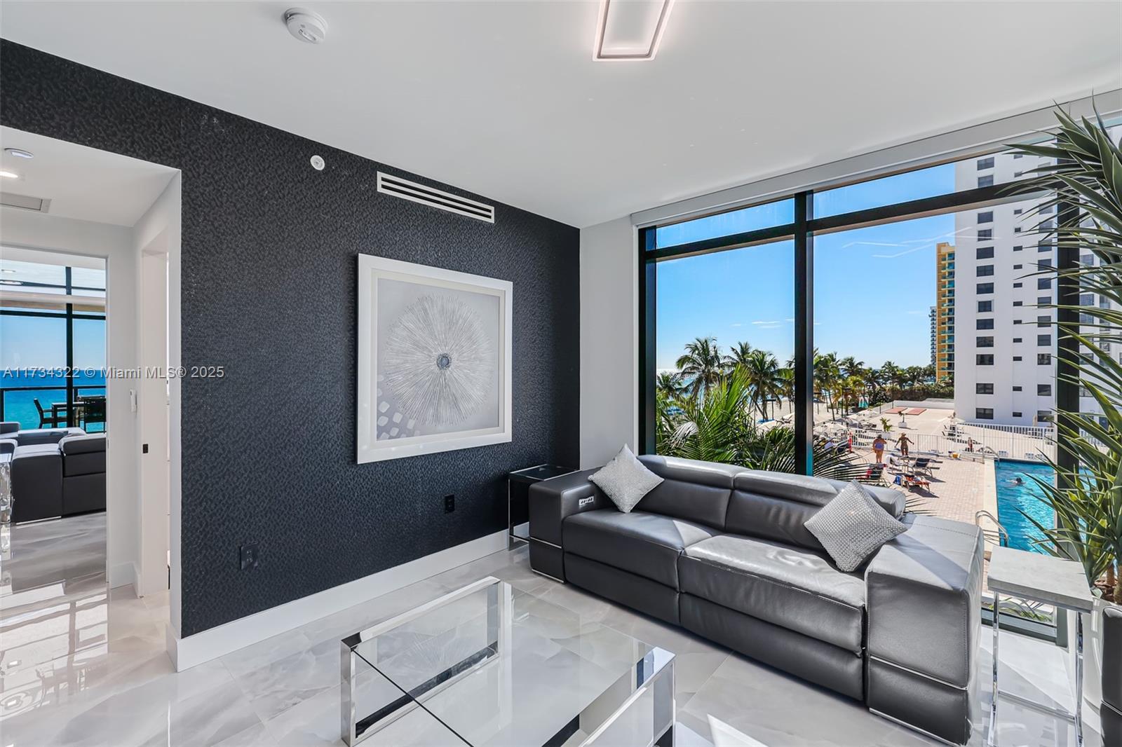 2205 South Surf Road, Unit 4A Hollywood, FL 33019 - Photo 47 of 71 a living room with furniture and a large window