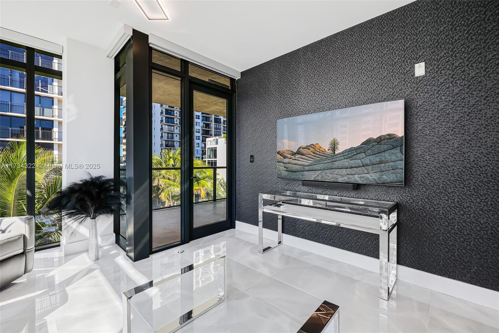 2205 South Surf Road, Unit 4A Hollywood, FL 33019 - Photo 49 of 71 a room with furniture cabinets and a flat screen tv