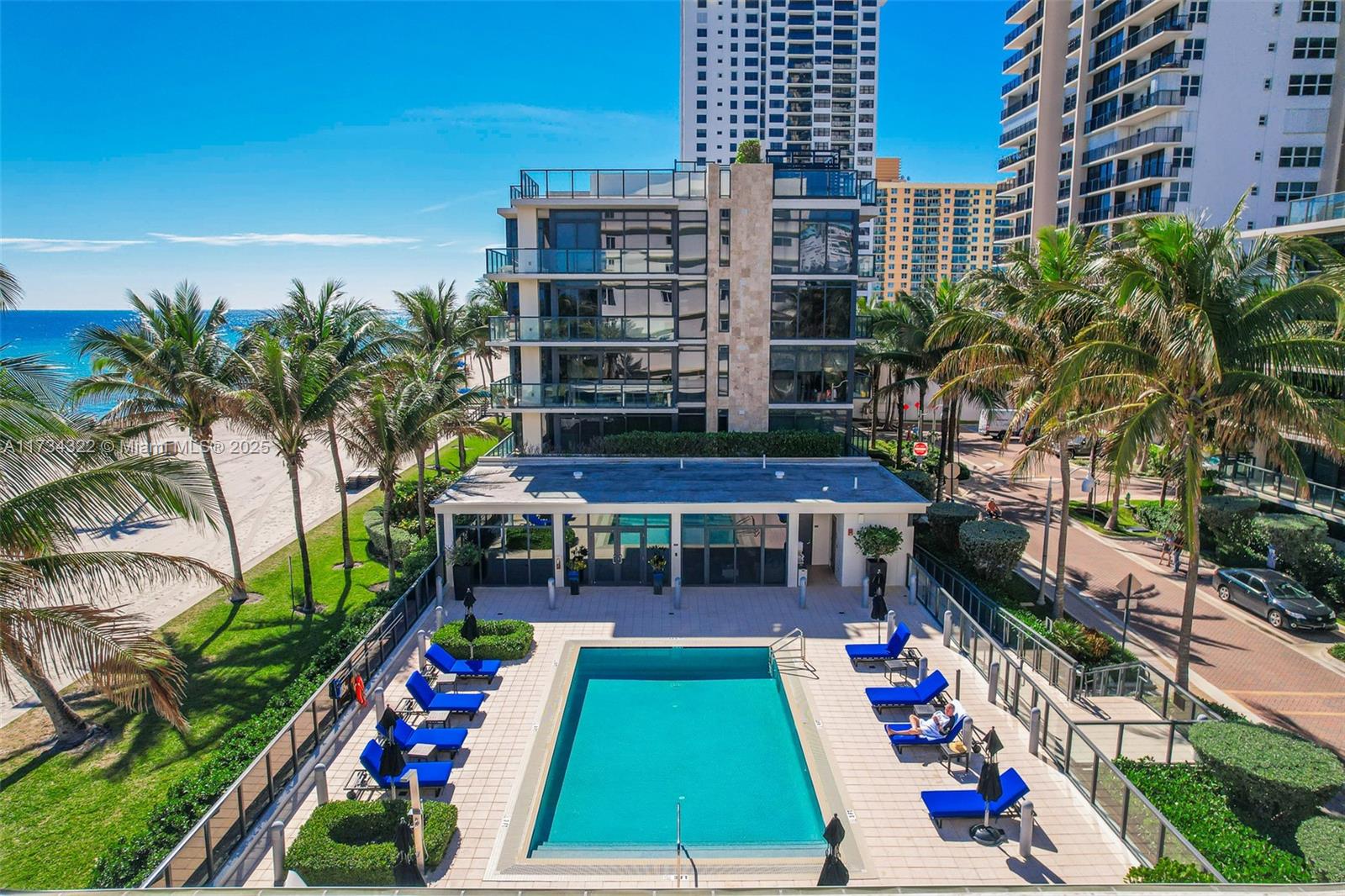 2205 South Surf Road, Unit 4A Hollywood, FL 33019 - Photo 68 of 71 a view of house with swimming pool outdoor seating