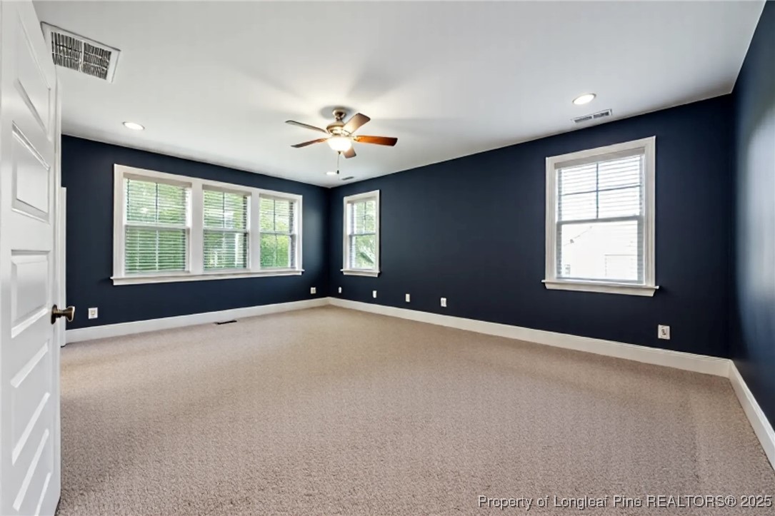 405 Gilpin Way Cary, NC 27519 - Photo 21 of 34 a view of an empty room with a window