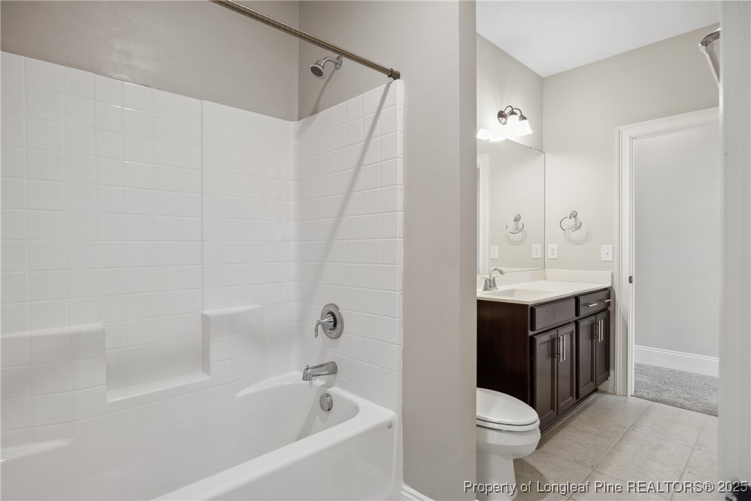 405 Gilpin Way Cary, NC 27519 - Photo 27 of 34 a bathroom with a sink toilet and shower