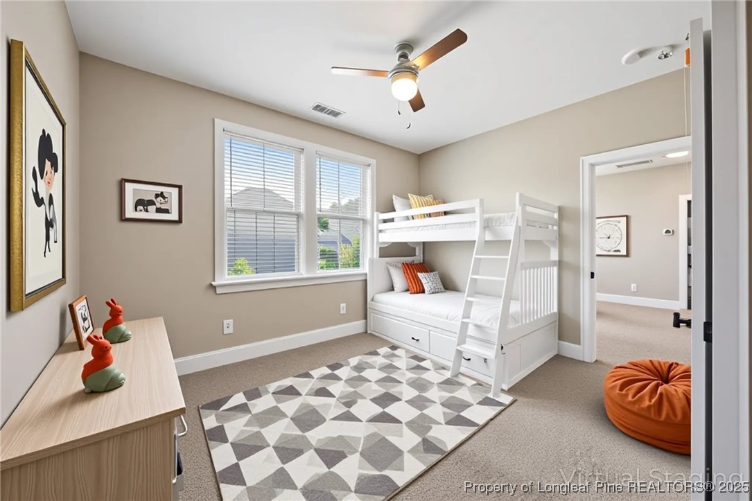 405 Gilpin Way Cary, NC 27519 - Photo 28 of 34 a living room with furniture and a window