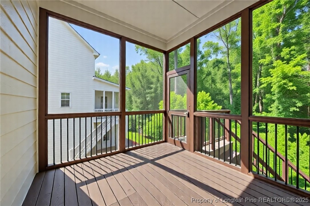 405 Gilpin Way Cary, NC 27519 - Photo 7 of 34 a balcony with wooden floor