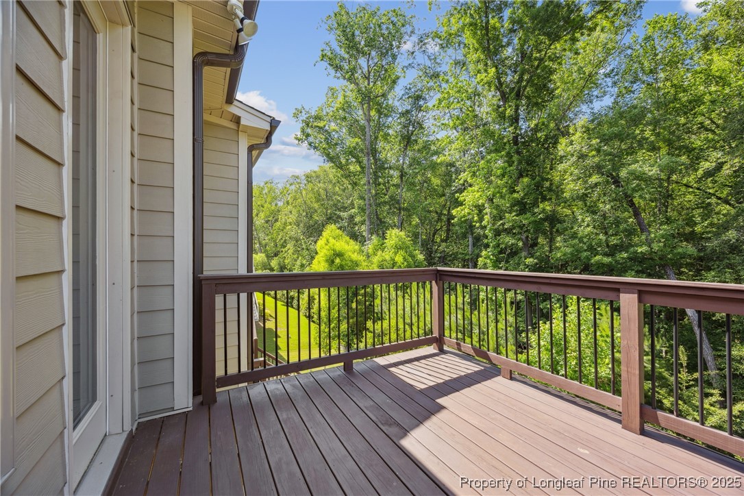 405 Gilpin Way Cary, NC 27519 - Photo 8 of 34 a view of balcony with wooden floor