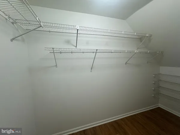 a view of a room with racks on the wall