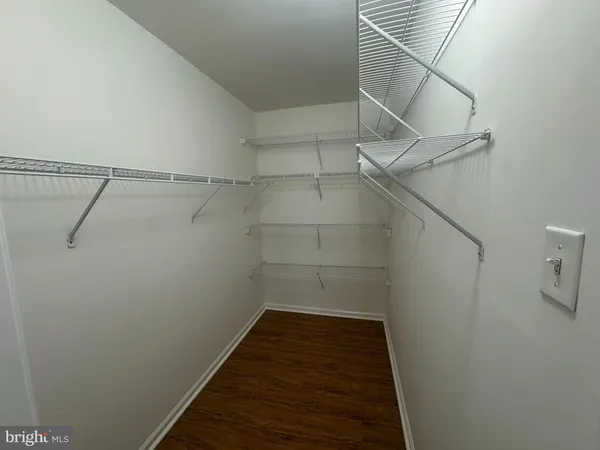 a view of a room with racks on the wall