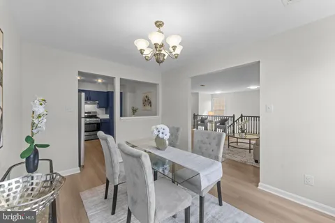 a view of a hallway with washer and dryer