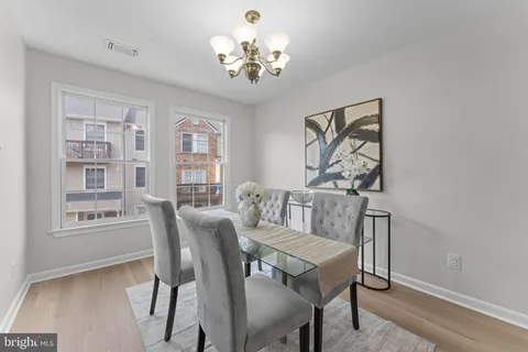 a bathroom with a double vanity sink mirror and shower