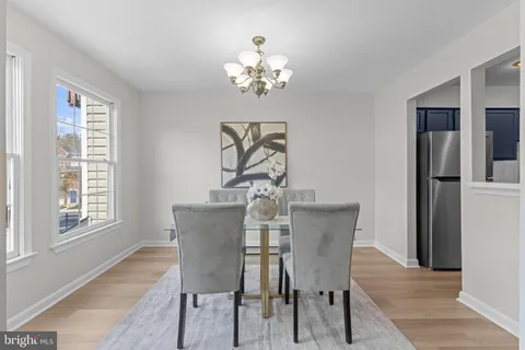 a bathroom with a sink vanity and a mirror