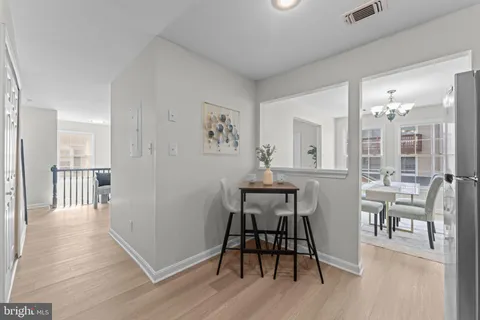 a bathroom with a double vanity sink and mirror