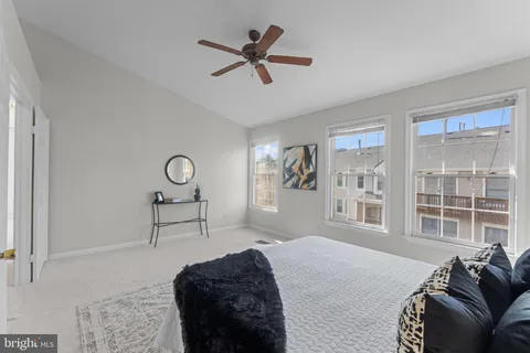 a view of a car parked in front of a building