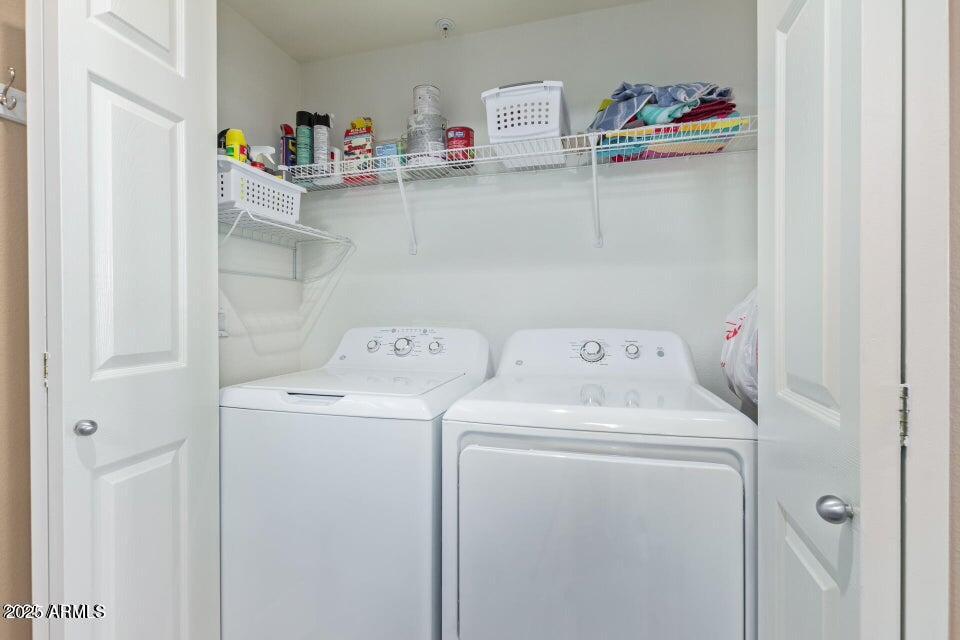 19777 North 76th Street, Unit 1332 Scottsdale, AZ 85255 - Photo 16 of 25 a utility room with dryer and washer