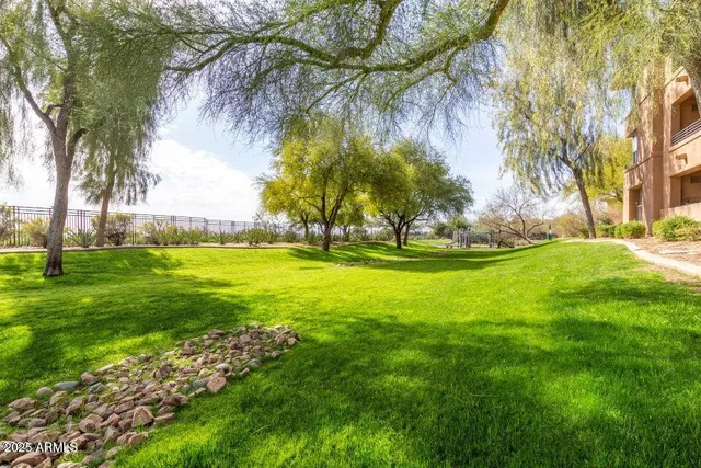 a view of a house with a yard porch and sitting area