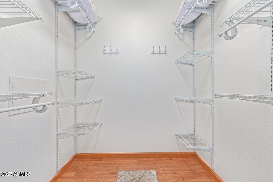 19777 North 76th Street, Unit 1332 Scottsdale, AZ 85255 - Photo 9 of 25 a view of a room with racks on the wall