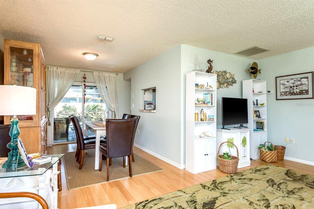 2011 Del-Betmar Road Clearwater, FL 33763 - Photo 11 of 51 a dining room with furniture window and wooden floor
