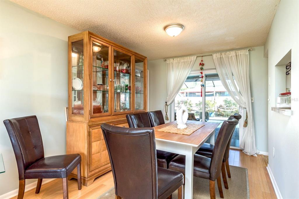 2011 Del-Betmar Road Clearwater, FL 33763 - Photo 12 of 51 a view of a dining room with furniture window and outside view