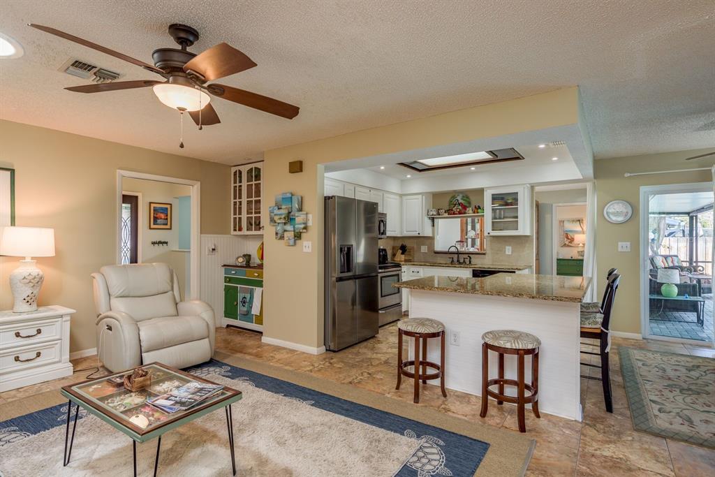 2011 Del-Betmar Road Clearwater, FL 33763 - Photo 16 of 51 a living room with furniture and a table