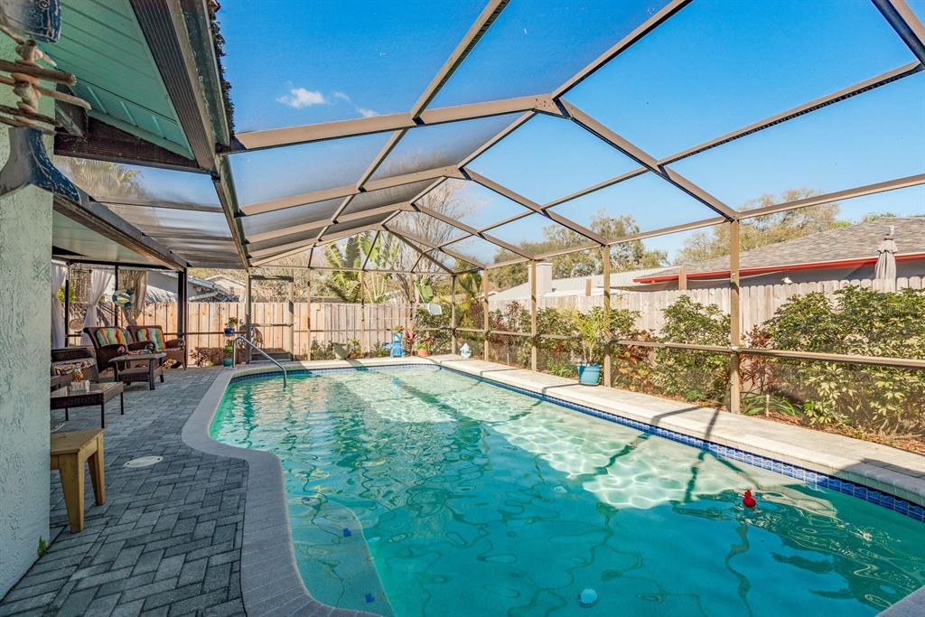 2011 Del-Betmar Road Clearwater, FL 33763 - Photo 2 of 51 a view of a swimming pool with a patio