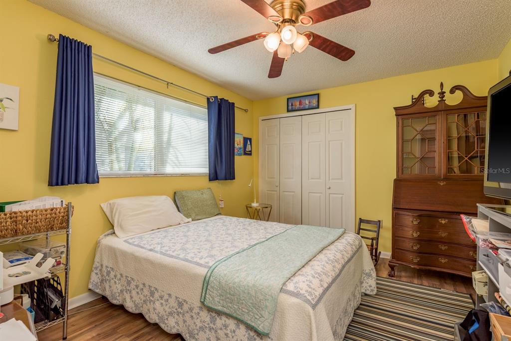 2011 Del-Betmar Road Clearwater, FL 33763 - Photo 27 of 51 a bedroom with a bed dresser and a window