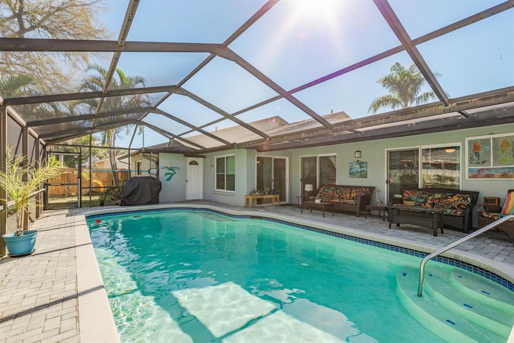 2011 Del-Betmar Road Clearwater, FL 33763 - Photo 38 of 51 a view of a house with backyard porch and sitting area