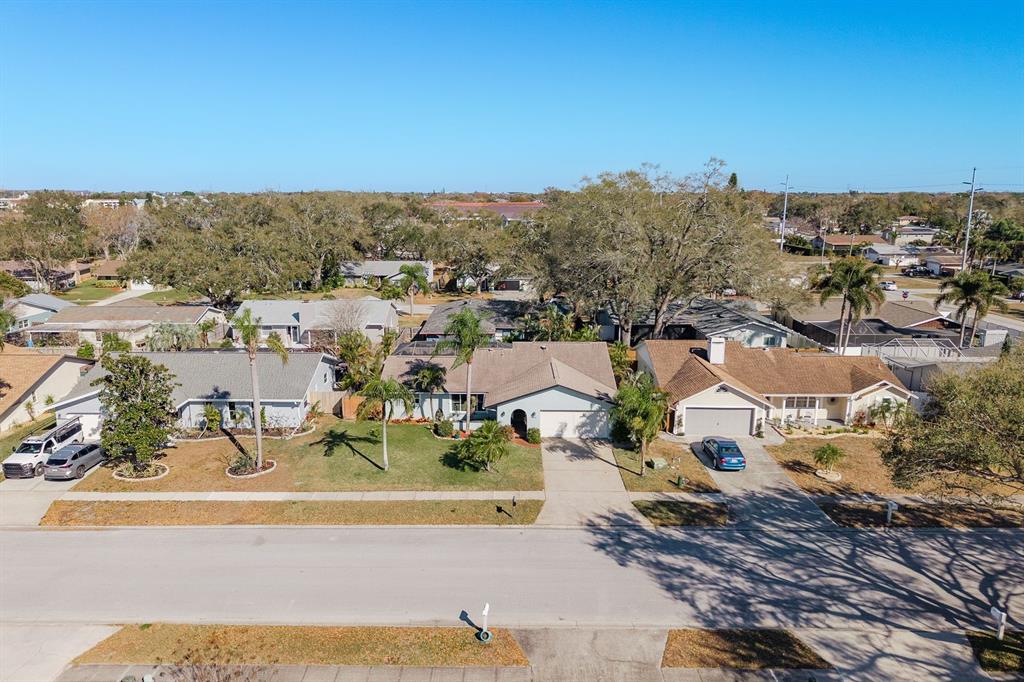 2011 Del-Betmar Road Clearwater, FL 33763 - Photo 46 of 51 an aerial view of residential houses with outdoor space and trees