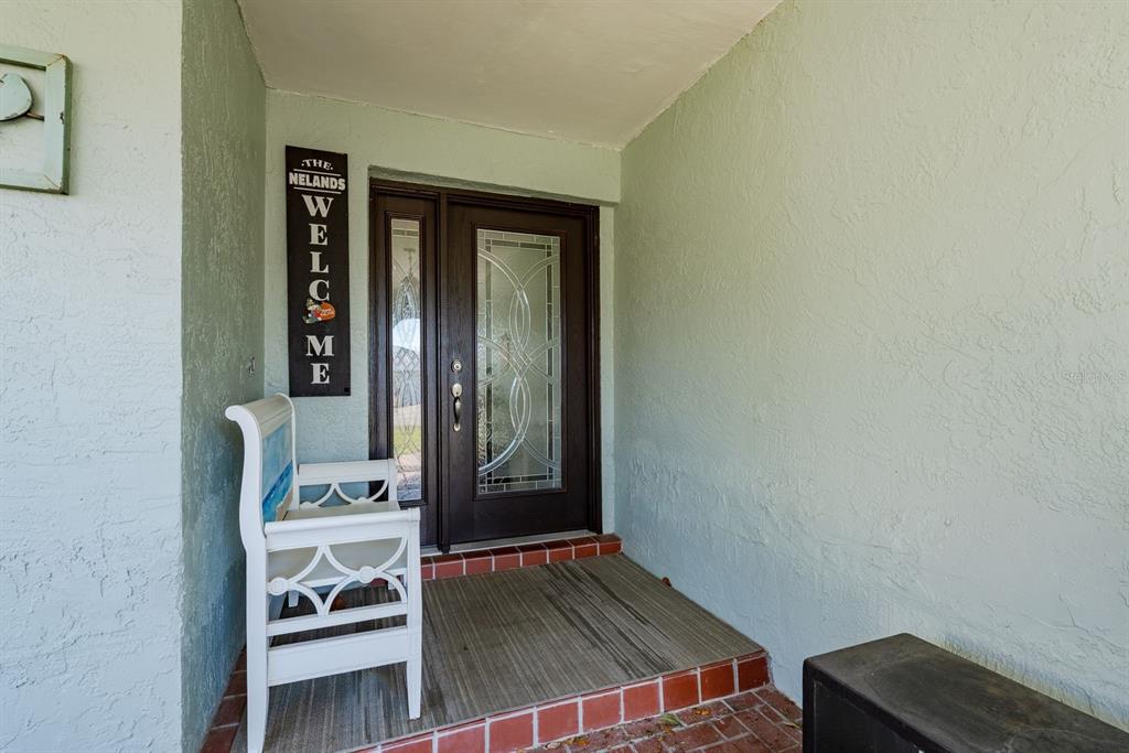2011 Del-Betmar Road Clearwater, FL 33763 - Photo 5 of 51 wooden floor and chair in a room