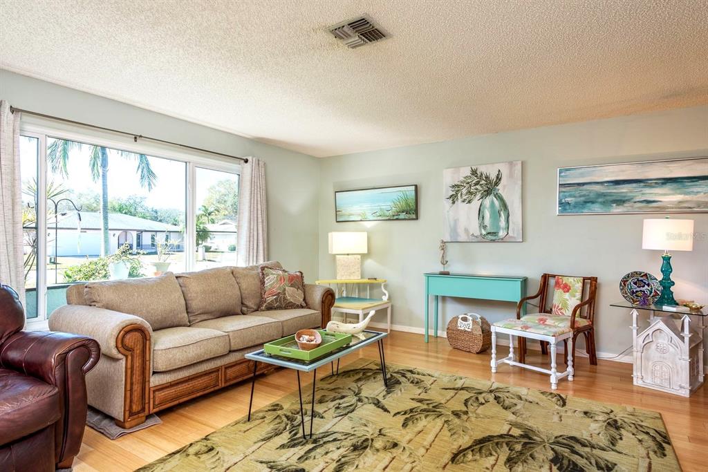 2011 Del-Betmar Road Clearwater, FL 33763 - Photo 8 of 51 a living room with furniture and a large window