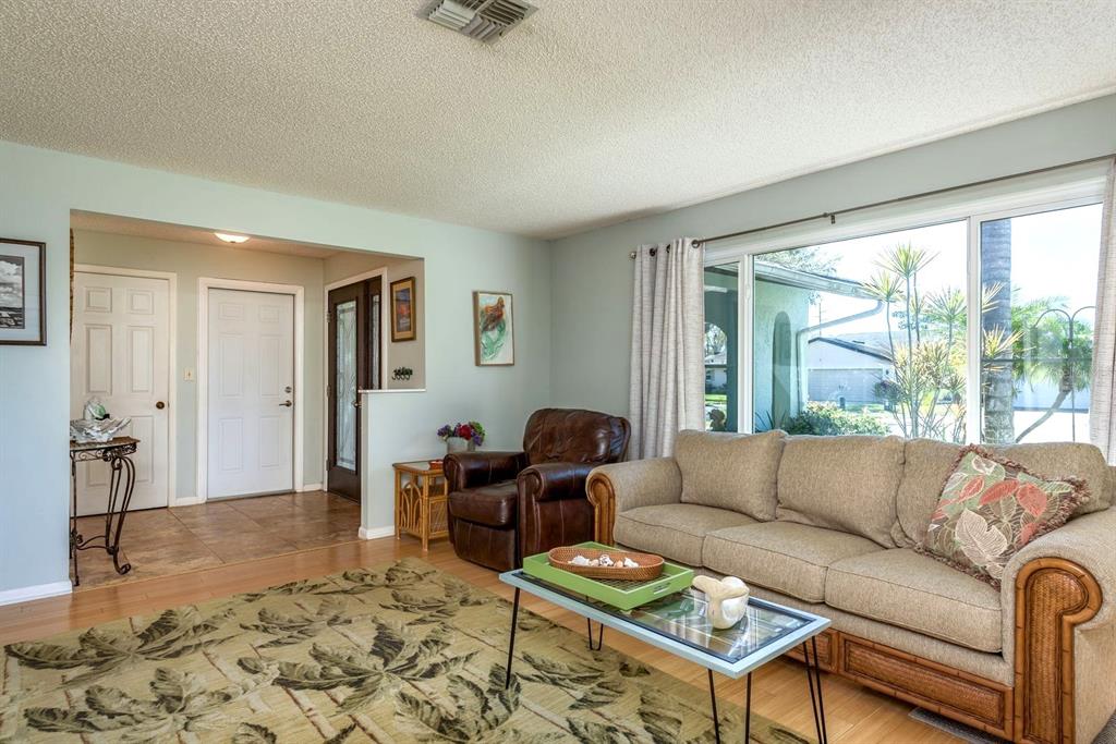2011 Del-Betmar Road Clearwater, FL 33763 - Photo 10 of 51 a living room with furniture and a large window