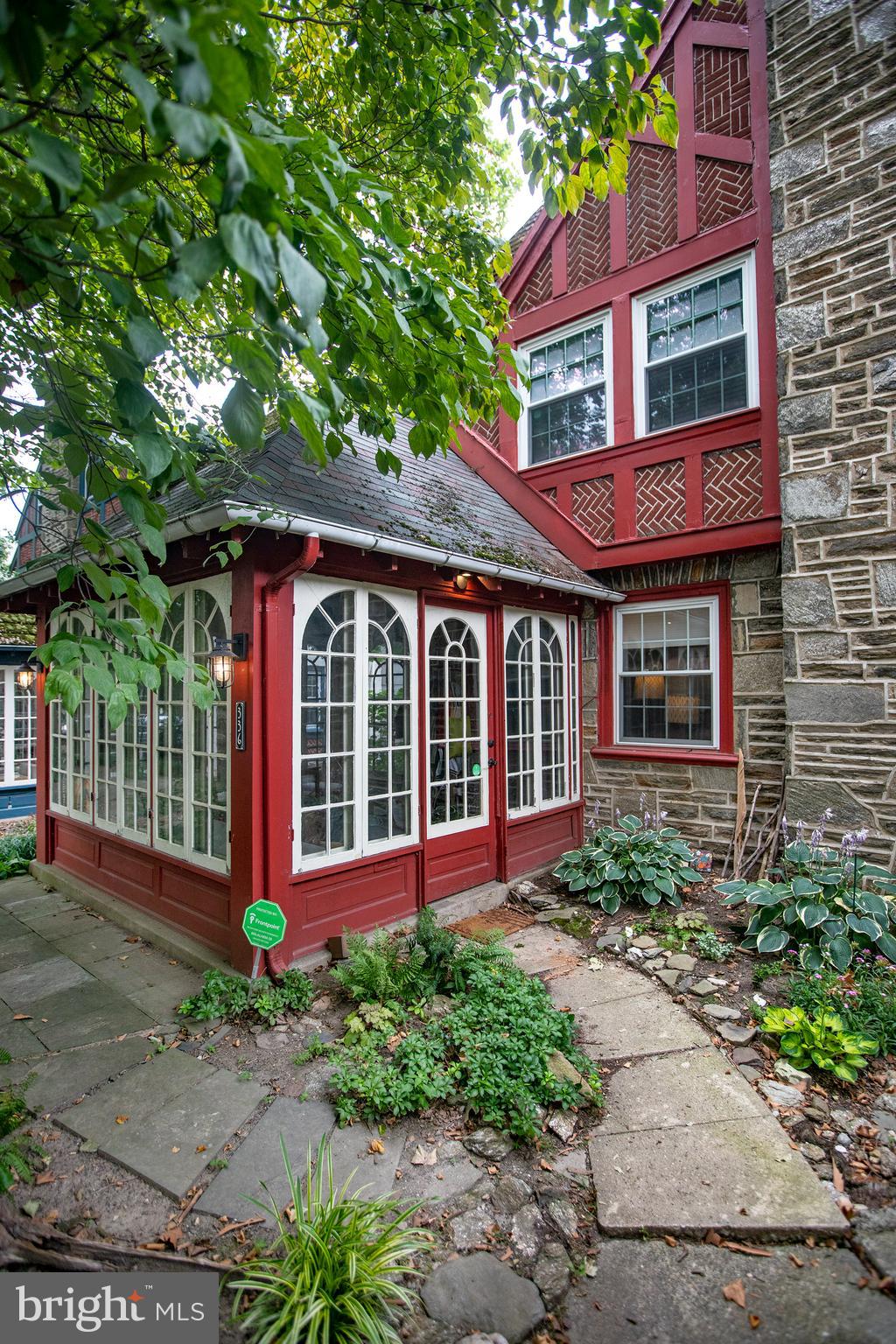336 Wellesley Road Philadelphia, PA 19119 - Photo 27 of 27 Front of house with sunroom