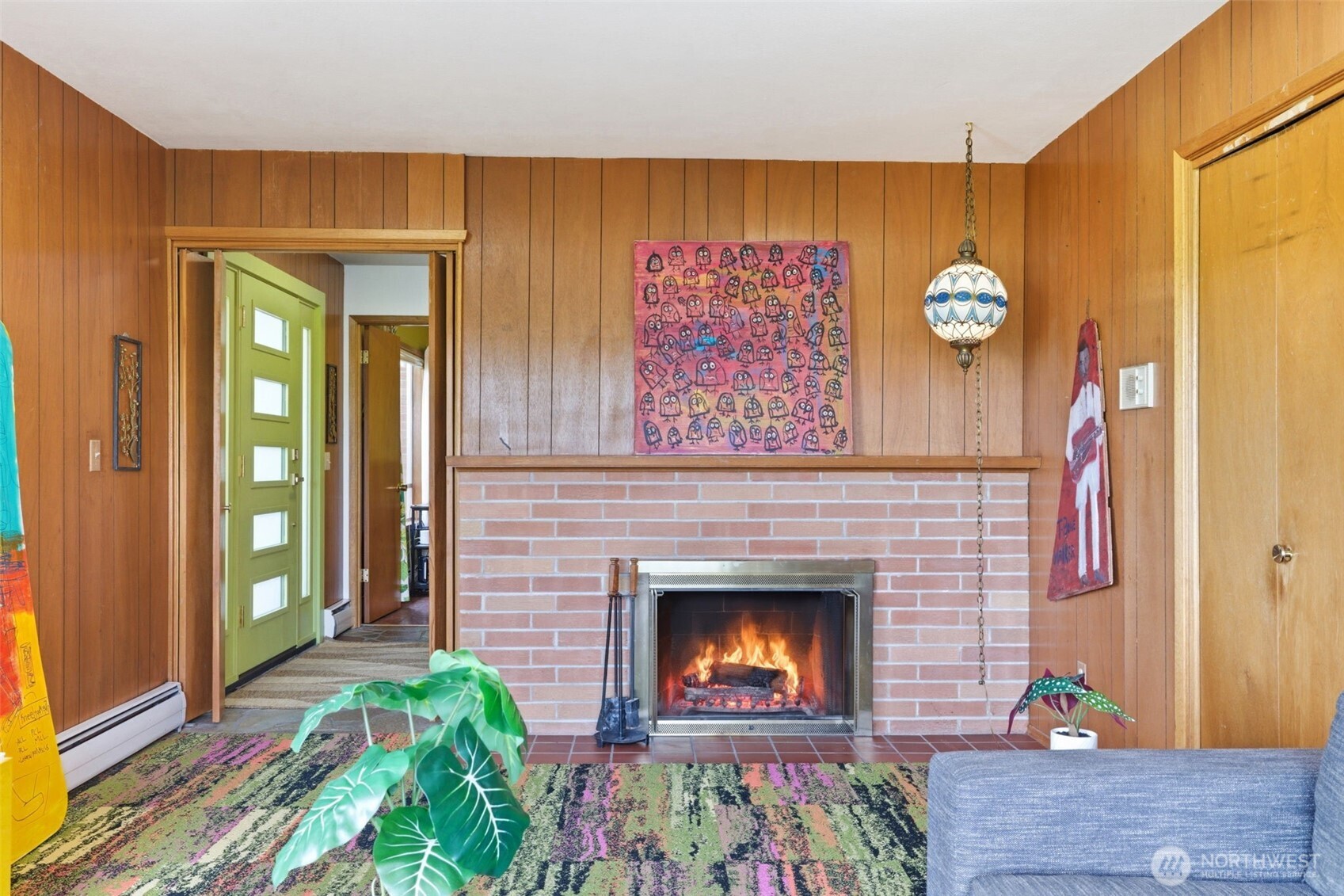2803 South Walker Street Seattle, WA 98144 - Photo 9 of 40 a living room with furniture and a fireplace