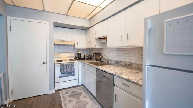 a view of balcony with furniture