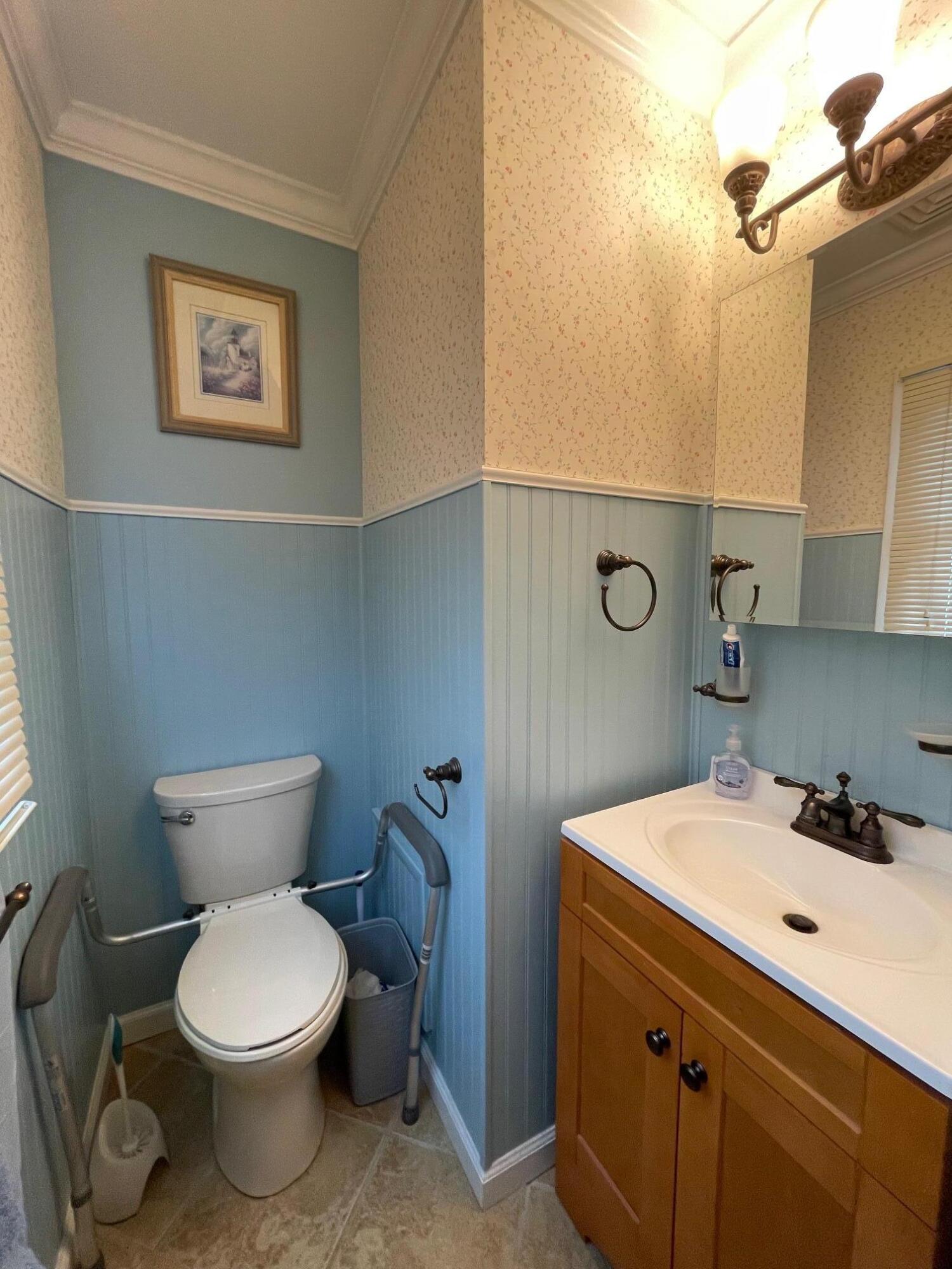 126 Friendship Road Kunkletown, PA 18058 - Photo 16 of 47 a bathroom with a toilet a sink and mirror