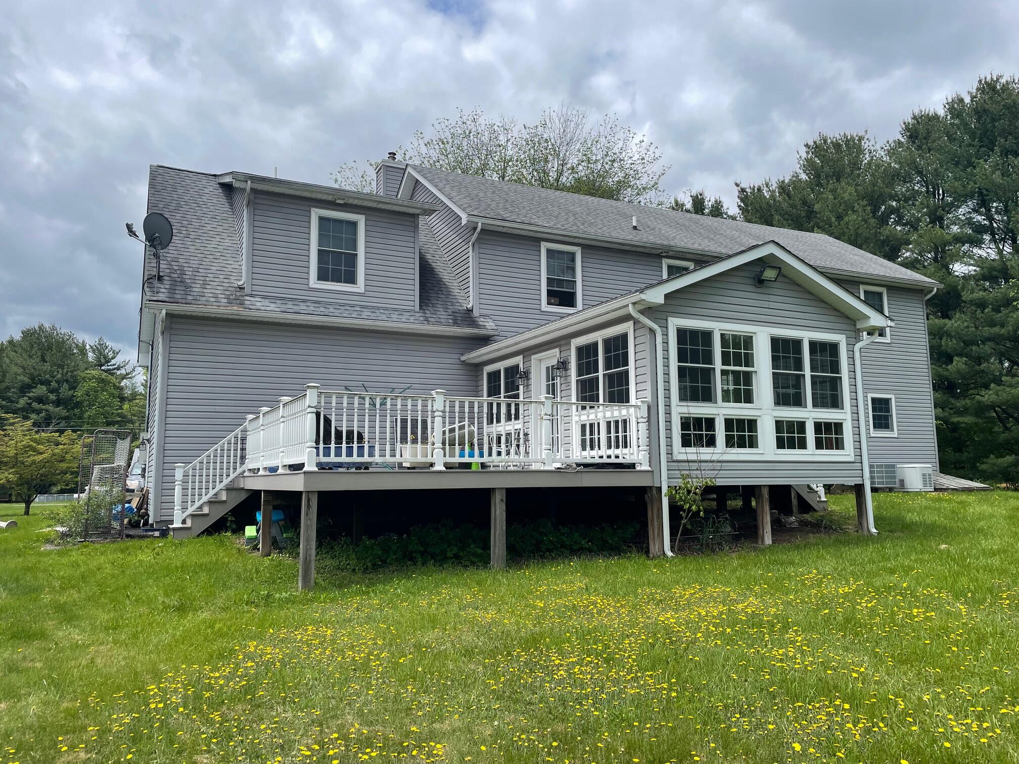 126 Friendship Road Kunkletown, PA 18058 - Photo 3 of 47 a front view of a house with a yard table and chairs