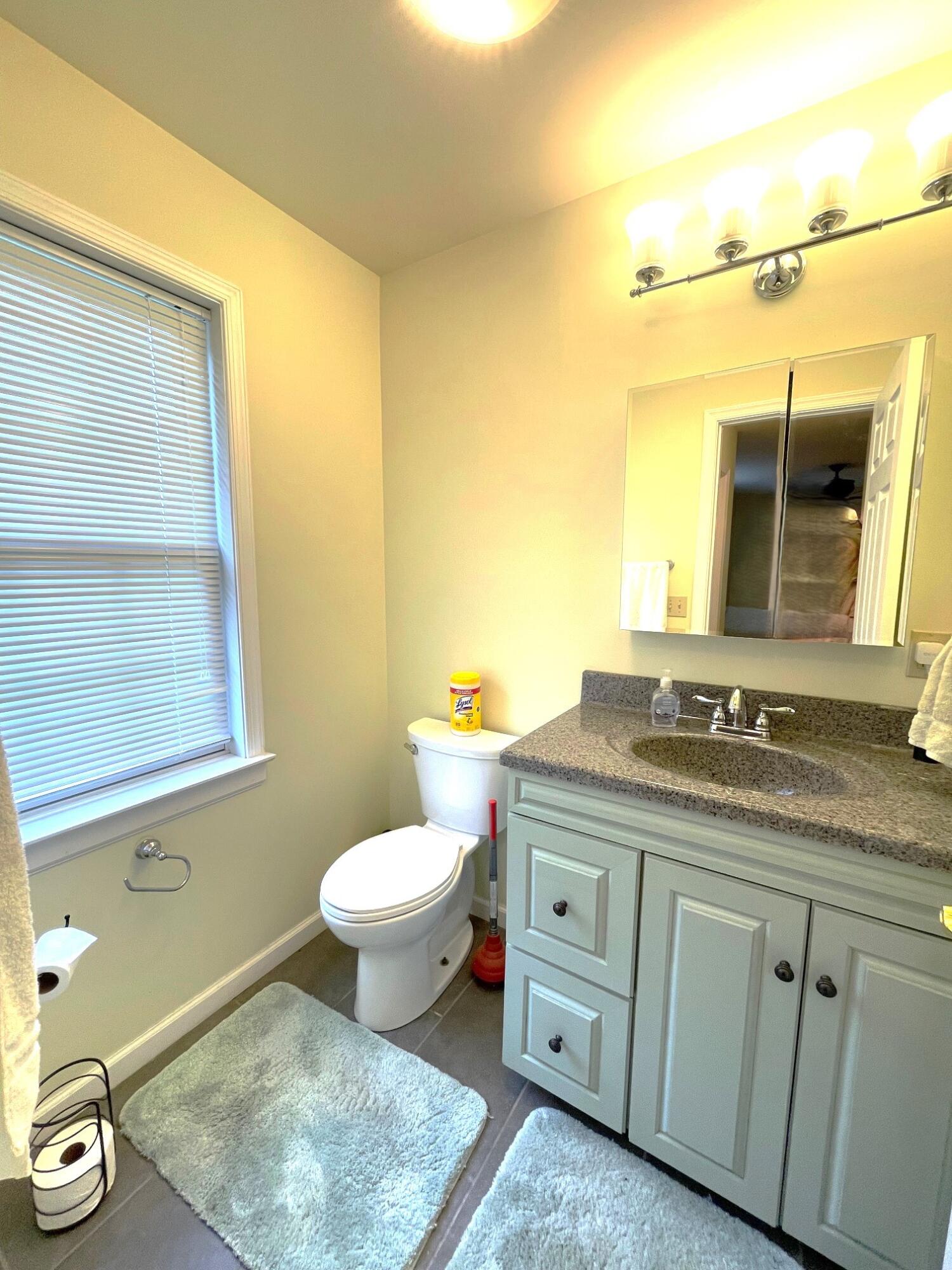 126 Friendship Road Kunkletown, PA 18058 - Photo 34 of 47 a bathroom with a granite countertop toilet sink and mirror