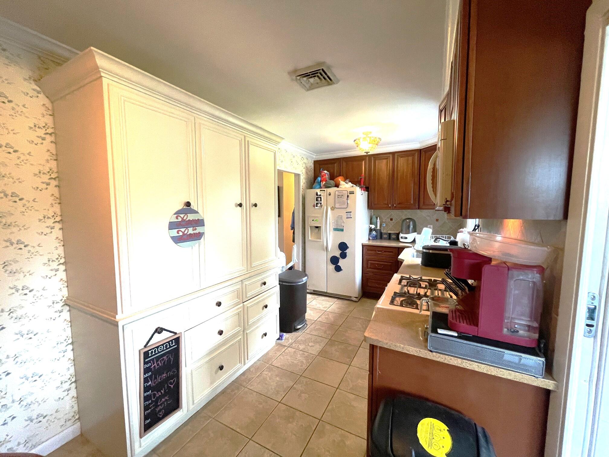 126 Friendship Road Kunkletown, PA 18058 - Photo 9 of 47 a kitchen with stainless steel appliances kitchen island granite countertop a sink stove and refrigerator