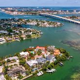 an aerial view of a city with ocean view