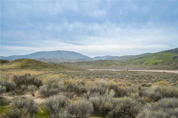 a view of mountain with lake view