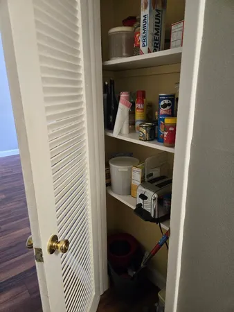 a view of dining room with racks on the wall