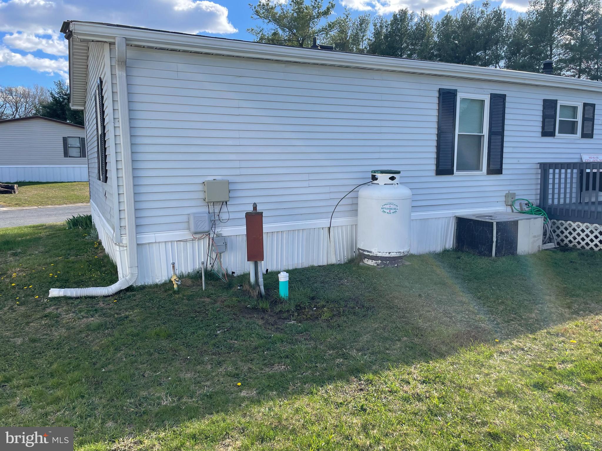 341 Jacobs Loop, Unit 16 Bear, DE 19701 - Photo 7 of 28 Propane tank in rear of home