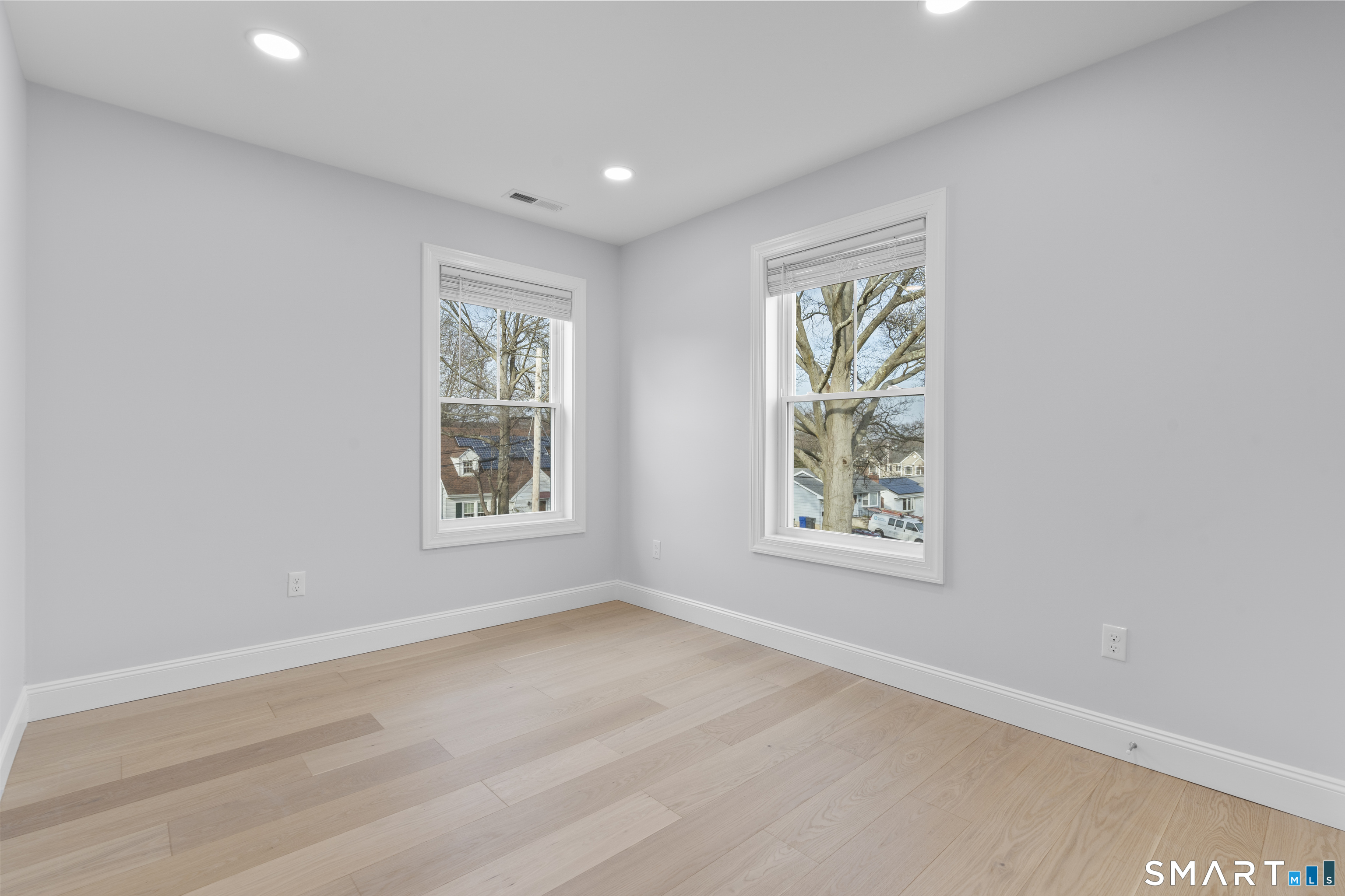 183 Vesper Street Fairfield, CT 06825 - Photo 17 of 40 an empty room with windows