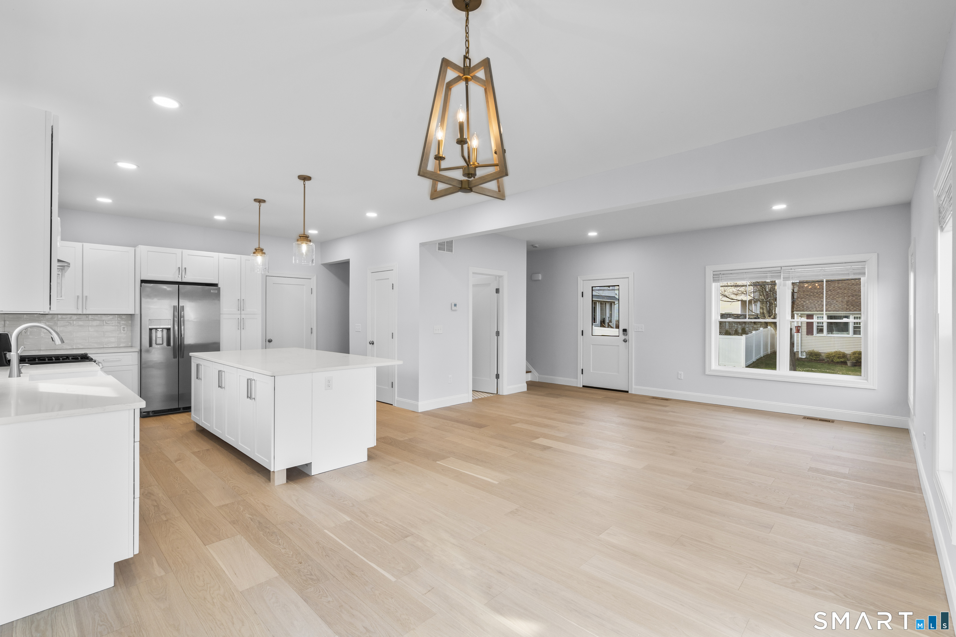 183 Vesper Street Fairfield, CT 06825 - Photo 2 of 40 a view of kitchen with furniture and refrigerator