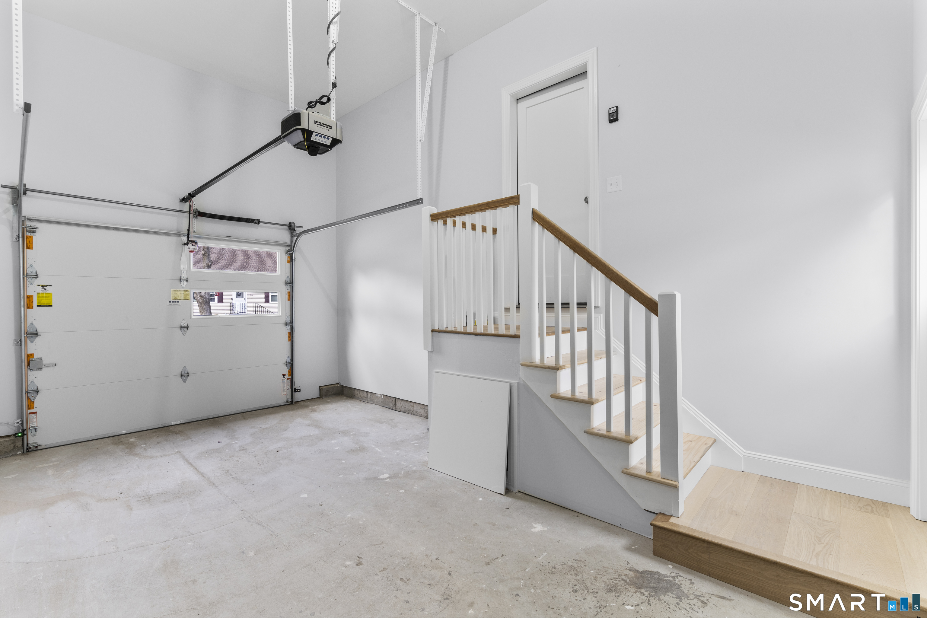 183 Vesper Street Fairfield, CT 06825 - Photo 25 of 40 a view of an entryway with stairs